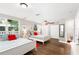 Two twin beds, a ceiling fan, and nautical decor at 1006 E Fern St, Tampa, FL 33604