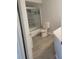 Bathroom with tile shower and floor at 318 Windrush Blvd # 9, Indian Rocks Beach, FL 33785