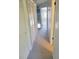 Hallway with neutral walls and carpet at 318 Windrush Blvd # 9, Indian Rocks Beach, FL 33785