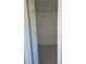 Walk-in closet with wire shelving at 318 Windrush Blvd # 9, Indian Rocks Beach, FL 33785