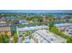 Aerial view of waterfront community with pool at 318 Windrush Blvd # 9, Indian Rocks Beach, FL 33785