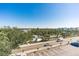 Aerial view of property showing surrounding neighborhood, streets, and park at 19610 Gulf Blvd # 409, Indian Shores, FL 33785