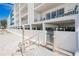 Building exterior with parking and beach access at 19610 Gulf Blvd # 409, Indian Shores, FL 33785