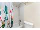 Bathroom with shower/tub combo and cactus-themed shower curtain at 19610 Gulf Blvd # 409, Indian Shores, FL 33785