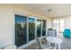 Outdoor balcony space with seating for relaxing at 19610 Gulf Blvd # 409, Indian Shores, FL 33785