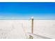 Beach walkway with dune walkover at 19610 Gulf Blvd # 409, Indian Shores, FL 33785