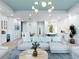 Spacious living room with light-colored sectional sofa at 6700 Burlington N Ave, St Petersburg, FL 33710