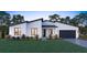 Modern one-story home with a black garage door at 6700 Burlington N Ave, St Petersburg, FL 33710