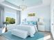 Bright bedroom with large window and comfortable seating area at 6700 Burlington N Ave, St Petersburg, FL 33710