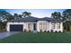One-story home with dark gray garage doors at 6700 Burlington N Ave, St Petersburg, FL 33710