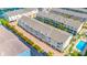 Aerial view of multi-unit homes, landscaping and boat slips for residents at 1109 Pinellas Bayway S # 306, Tierra Verde, FL 33715