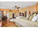 A comfortable bedroom features hardwood floors, mirrored closets, and lots of decorative ornamentation at 1109 Pinellas Bayway S # 306, Tierra Verde, FL 33715