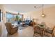 Spacious living room boasts water views and ample seating at 8001 Sailboat Key S Blvd # 204, St Pete Beach, FL 33707