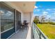 Private balcony overlooking water and green space at 8001 Sailboat Key S Blvd # 204, St Pete Beach, FL 33707