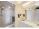 Clean bathroom with shower/tub combo and vanity at 8001 Sailboat Key S Blvd # 204, St Pete Beach, FL 33707
