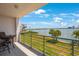Balcony with water view and seating area at 8001 Sailboat Key S Blvd # 204, St Pete Beach, FL 33707