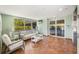 Inviting condo lobby with seating area and elevator access at 8001 Sailboat Key S Blvd # 204, St Pete Beach, FL 33707