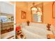 Elegant bathroom with a jetted tub and double vanity at 1109 Pinellas Bayway S # 306, Tierra Verde, FL 33715