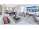 Open living room with sectional sofa and city views at 301 1St S St # 2905, St Petersburg, FL 33701