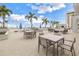 Outdoor patio with seating, grilling station, and a pool view at 301 1St S St # 2905, St Petersburg, FL 33701