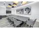 Modern conference room featuring a large table, comfortable chairs, and stylish artwork at 301 1St S St # 2905, St Petersburg, FL 33701