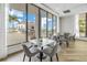 Community room with seating, tables, and an outdoor patio view at 301 1St S St # 2905, St Petersburg, FL 33701