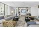 Modern lobby with comfortable seating areas and large screen TV at 301 1St S St # 2905, St Petersburg, FL 33701