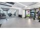 Modern fitness center with various equipment and mirrors at 301 1St S St # 2905, St Petersburg, FL 33701