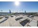 Expansive rooftop deck with numerous lounge chairs at 301 1St S St # 2905, St Petersburg, FL 33701