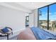 Spacious bedroom with city views and a cozy sitting area at 301 1St S St # 2905, St Petersburg, FL 33701