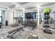 Fitness center with free weights, weight machines, and a large screen TV at 301 1St S St # 2905, St Petersburg, FL 33701