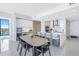 Modern kitchen with island and adjacent dining area at 301 1St S St # 2905, St Petersburg, FL 33701