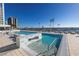 Luxury rooftop pool with city views and lounge chairs at 301 1St S St # 2905, St Petersburg, FL 33701