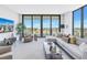 Modern living room with sectional sofa and city views at 301 1St S St # 2905, St Petersburg, FL 33701