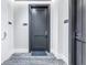 Hallway with gray doors and carpet flooring at 301 1St S St # 2905, St Petersburg, FL 33701