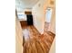 Kitchen with wood cabinets, stainless steel appliances and wood-look floors at 5816 Congress St # 104, New Port Richey, FL 34653