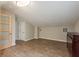 Large bedroom with wood-look floors features neutral walls with natural light, ceiling fan and a closet at 49 W Boyer St, Tarpon Springs, FL 34689