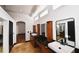 A luxurious bathroom featuring and sinks, black countertops, and black trimmed mirrors at 1570 Preserve Way, Clearwater, FL 33764