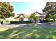 Well-maintained front yard showcasing beautiful landscaping and mature trees at 1570 Preserve Way, Clearwater, FL 33764