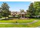 Beautiful two-story home with manicured landscaping and a large front yard at 1570 Preserve Way, Clearwater, FL 33764
