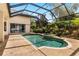 Refreshing pool and spa with a screened enclosure and ample space at 1570 Preserve Way, Clearwater, FL 33764