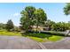 Beautiful home exterior with a lush lawn and mature trees at 1570 Preserve Way, Clearwater, FL 33764