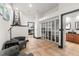 Home office with built-in bookcase and comfortable seating at 1570 Preserve Way, Clearwater, FL 33764