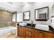 Bathroom with double vanity and granite countertops at 1570 Preserve Way, Clearwater, FL 33764