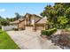 Two-car garage with driveway and landscaping at 1570 Preserve Way, Clearwater, FL 33764