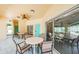Community room with tables and chairs for residents at 2465 Northside Dr # 702, Clearwater, FL 33761