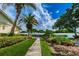 Landscaped walkway with lush greenery at 2465 Northside Dr # 702, Clearwater, FL 33761