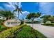 Community entrance sign for Woodland Villas at 2465 Northside Dr # 702, Clearwater, FL 33761