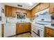 Galley kitchen with ample storage and counter space at 2465 Northside Dr # 702, Clearwater, FL 33761