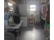 Functional laundry room with washer, dryer, sink, and storage shelves at 29 Concord Ln # 11, Palm Harbor, FL 34684